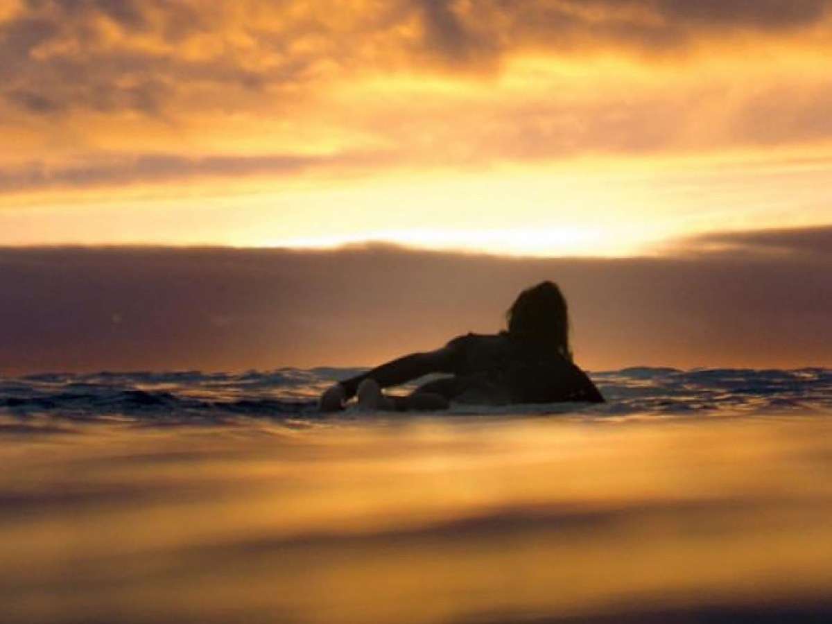 a sunset over a beach
